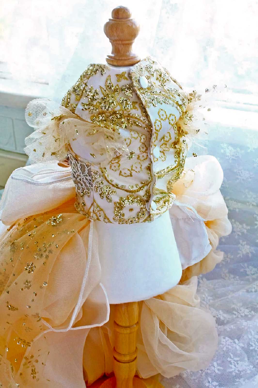 Golden glitter princess dog evening gown with a gorgeous trailing tulle train.