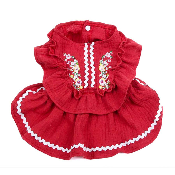 Front of the embroidered Traditional Mexican Fiesta Dog Dress in rojo from online dog clothing store they made me wear it.