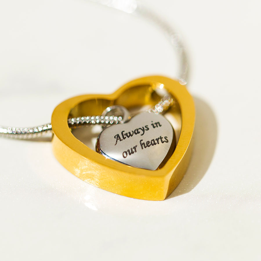 Beautiful Two Hearts Forever Urn Necklace engraved with Always in our hearts from online keepsake jewelry shop they made me wear it.