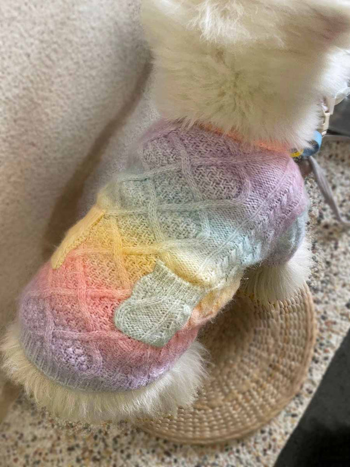 Westie showing off the back of the adorable Rainbow Wool-Knitted Dog Cardigan from online dog clothing store they made me wear it.