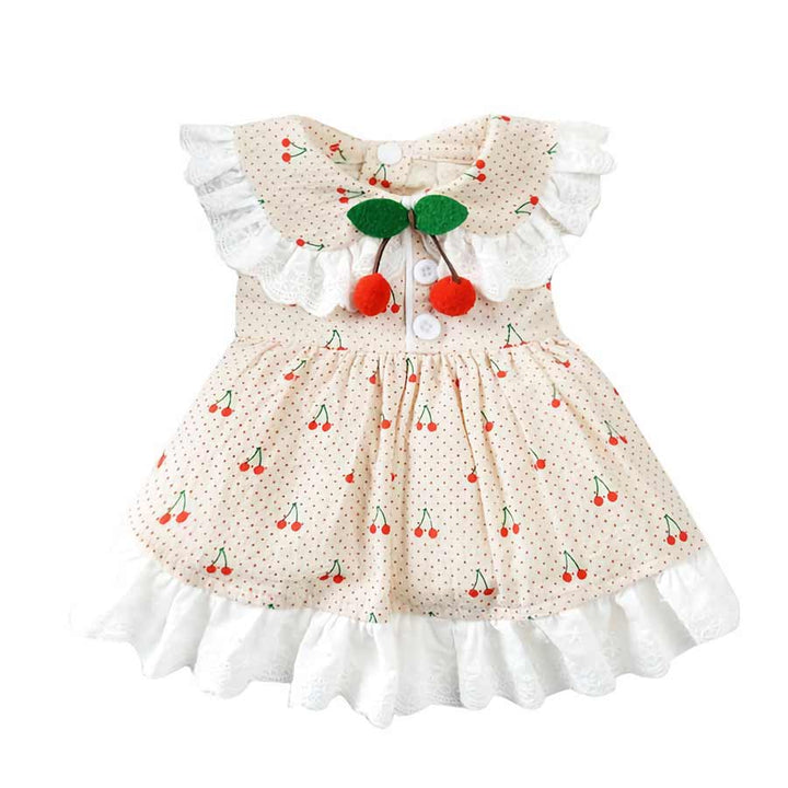 Lovely Cream Cherry Print Dog Dress with ruffles and lace from online posh puppy boutique they made me wear it. The perfect spring and summer dress for a Chihuahua, Shih Tzu, Yorkshire Terrier, Bichon mix, Toy Poodle and other small dog breeds.