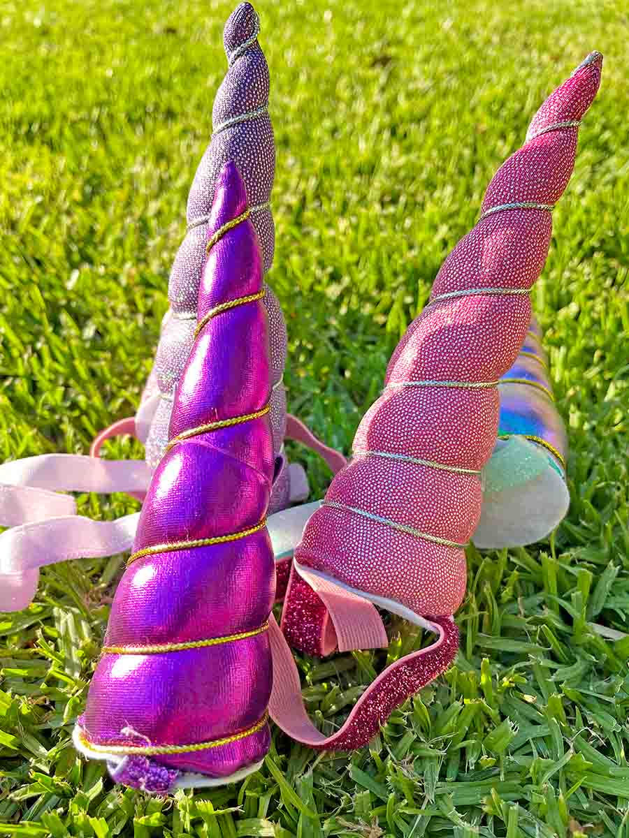 Metallic Purple, Hot Pink Sparkle, Violet Sparkle and Iridescent Violet Unicorn Horn for Dogs from online dog clothing store they made me wear it.