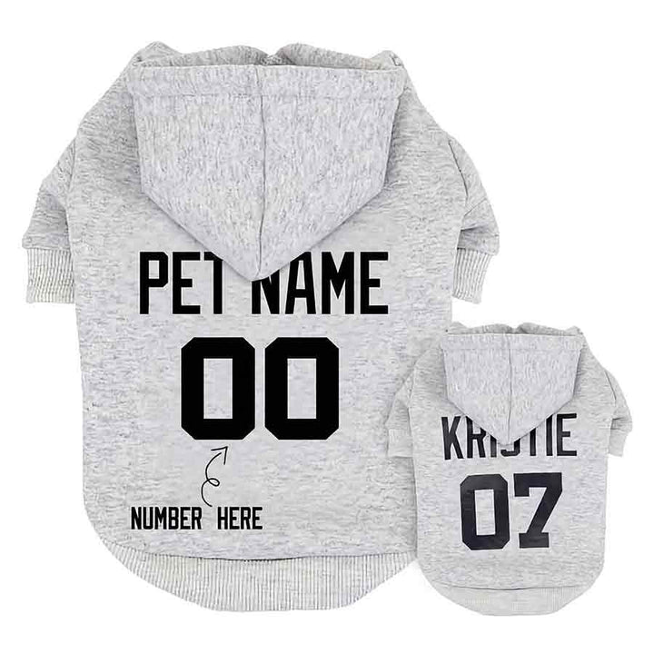 Personalized Dog Hoodie available in Neutral Gray. Customize the hoodie with your dog's name and your favorite number from online dog clothing store they made me wear it.