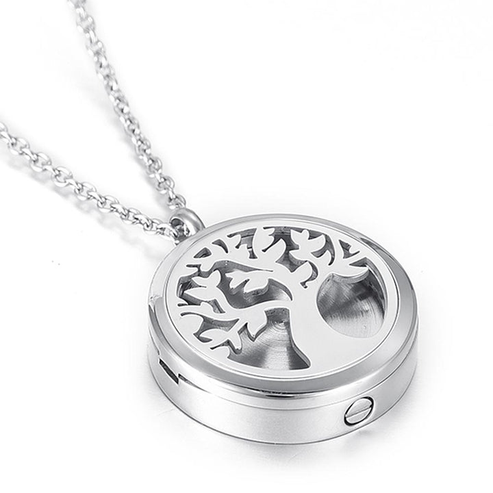 Beautiful Tree of Life Memorial Locket is the perfect bereavement gift for family and friends who want a cremation locket to hold a small amount of pet ashes to remember their dog who crossed over the rainbow bridge. The locket can also be used as an aromatherapy essential oil diffuser as it comes with 12 free felt pads. Available from online boutique they made me wear it.