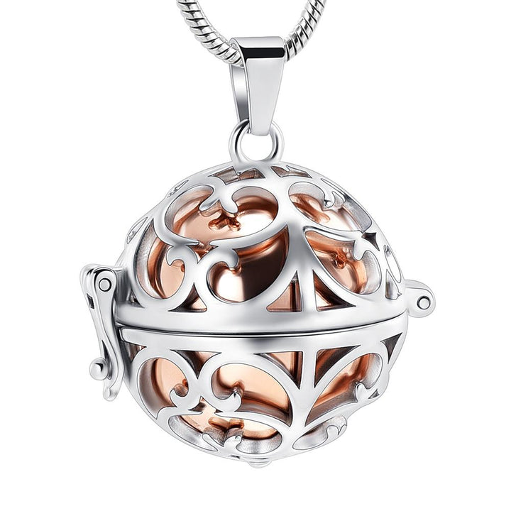 Cool Hollow Ball Steampunk Memorial Urn Necklace in Rose Gold is the perfect personalized bereavement gift for family and friends who want to wear a cremation necklace that holds a small amount of ashes to remember the loved ones they've lost. Free engraving available from online boutique they made me wear it.