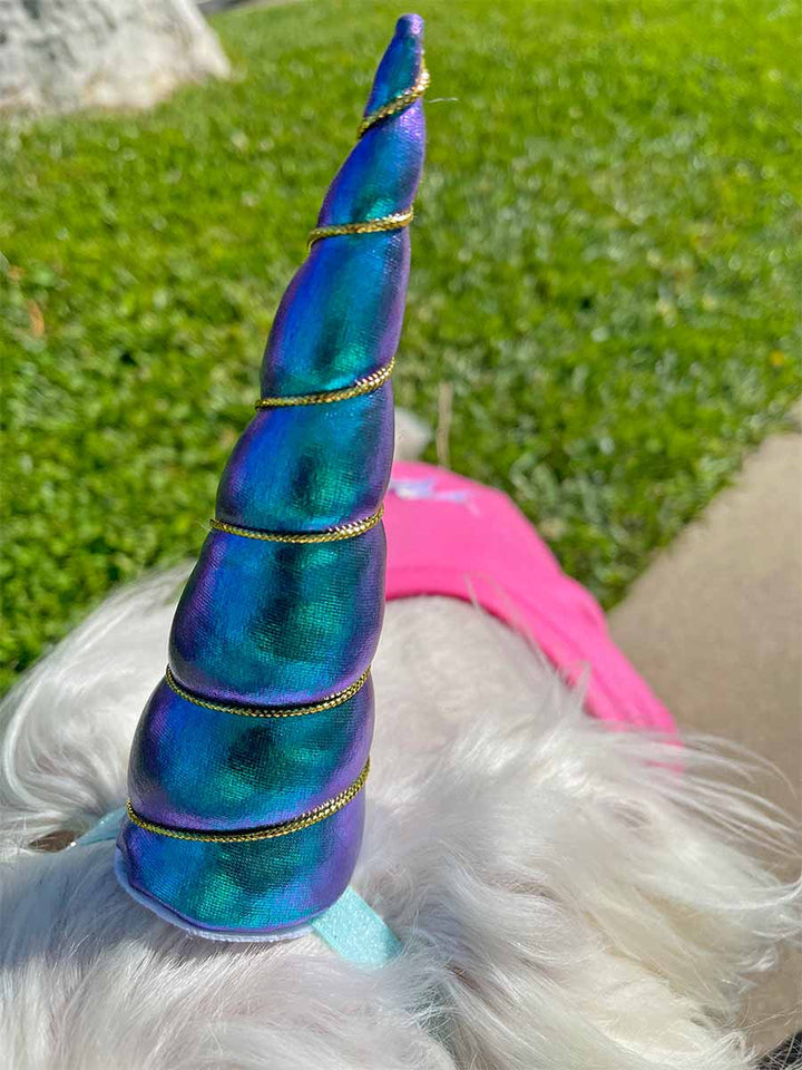 Iridescent Violet Unicorn Horn for Dogs and the adorable Hot Pink Embroidered Unicorns Rock Dog Tee from online dog clothing store they made me wear it.